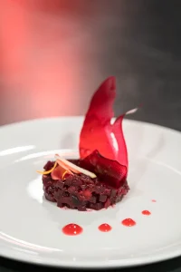 Artfully presented gourmet dish served at VIVOOD, inspired by the signature cuisine of Michelin-starred restaurants in Alicante